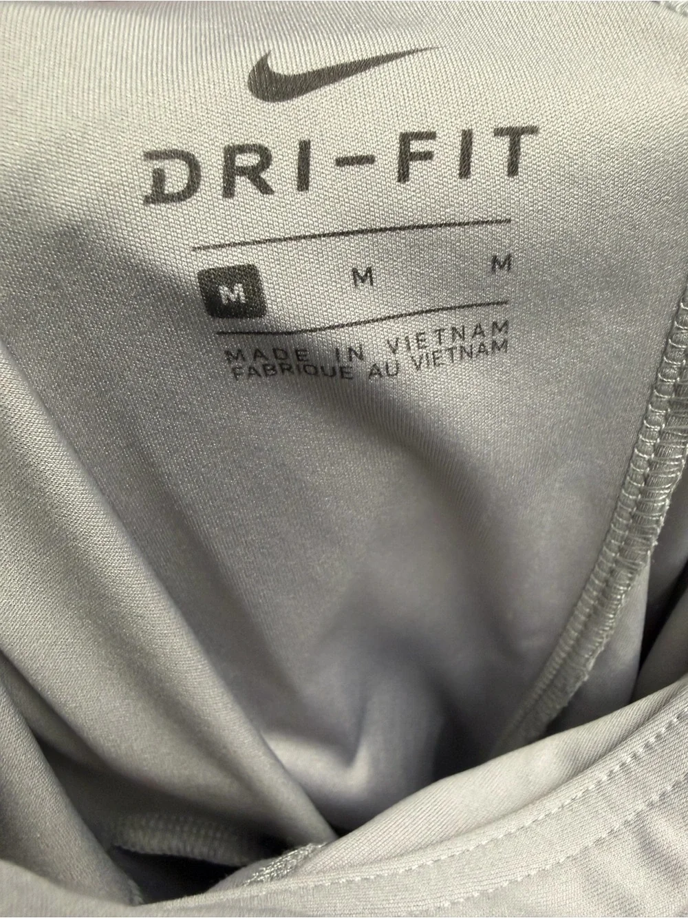 Nike Dri-FIT Athletic Tank in Light Gray with Black Logo